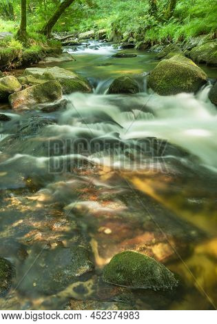 Golitha Falls,summertime Rocks And Flowing Waters,liskeard,cornwall,england,uk