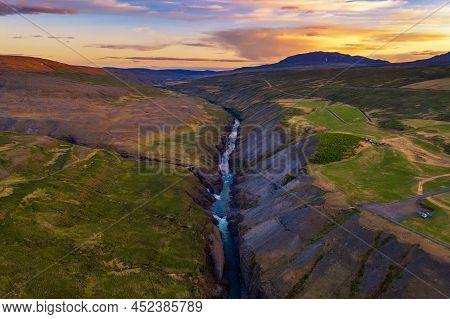 Aerial View Of The Studlagil Canyon With The Jokulsa A Bru River In East Iceland Photographed At Sun