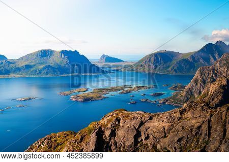 View Over Mountains And Fjords Of Lofoten Islands From Mount Festvagtind Near The Village Of Henning