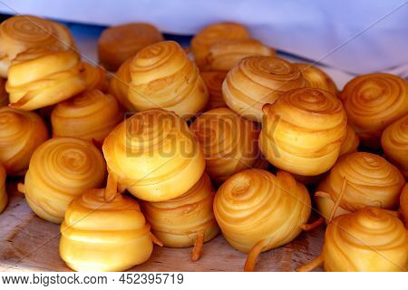 Traditional Slovakian Smoked Rolled Cheese Called Parenica In A Hungarian Agriculture Fair In Kaptal