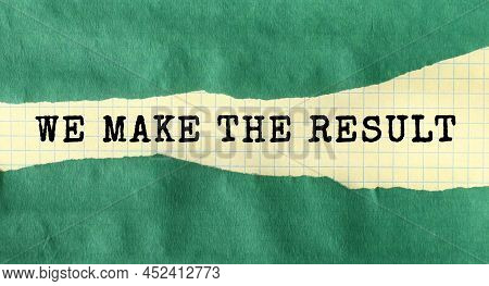 The We Make The Result Message Is Written On A Piece Of Paper. The Inscription Is Readable Under Gre
