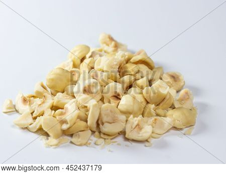 Heap Of Chopped Hazelnut, Pile Of  Diced Or Crushed, Peeled And Roasted  Hazelnut Isolated On White 