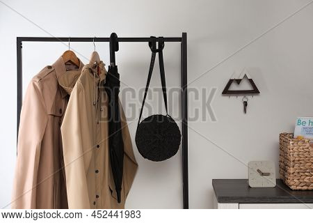 Modern Hallway Interior With Stylish Furniture And Key Holder