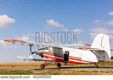 Small Light Airplane Ready To Flight On The Airport Field.