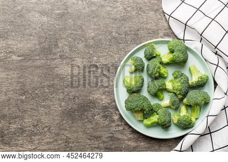 Broccoli Of Fresh Green Broccoli In Bowl Over Coloredbackground. , Close Up. Fresh Vegetable.