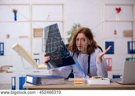 Young female doctor radiologist workiing in the clinic