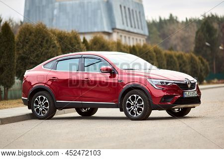 Berlin - March 2022: 2021 Renault Arkana E-tech Hybrid Suv Car Three Fourth Right Side Front View Ou