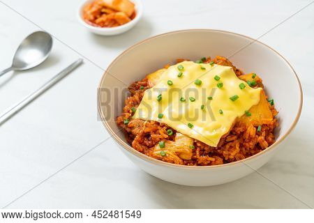 Kimchi Fried Rice With Pork And Topped Cheese