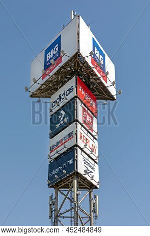 Indjija, Serbia - June 30, 2021: Big Fashion Outlet Sign Tower Near Indjija, Serbia.
