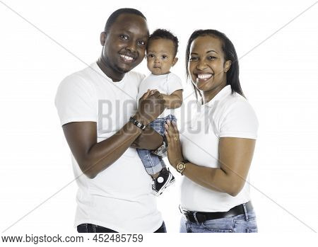 Young African American Family In The Studio With Baby Toddler Son