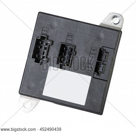 A Plastic Car Engine Control Unit With Metal Elements On A White Isolated Background Is The Connecti