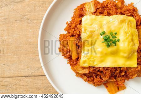 Kimchi Fried Rice With Pork And Topped Cheese