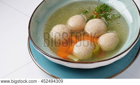 Jewish Chicken Broth With Kneidlach (balls Made With Matzo Meal)matzo Ball Soup