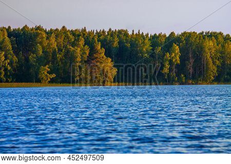 Karelian Lake With Edge Of Forest With Selective Focus.