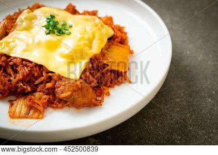 Kimchi Fried Rice With Pork And Topped Cheese