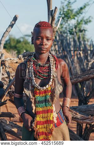 Turmi, Omo River Valley, Ethiopia - May 10, 2019: Portrait Of A Beautiful Woman In Hamar Village. Ha
