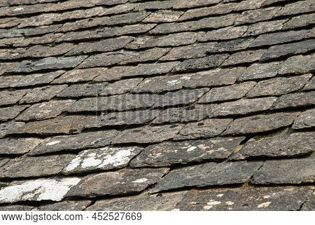 Old Stone Slade Tiles Roof Closeup As Stone Background