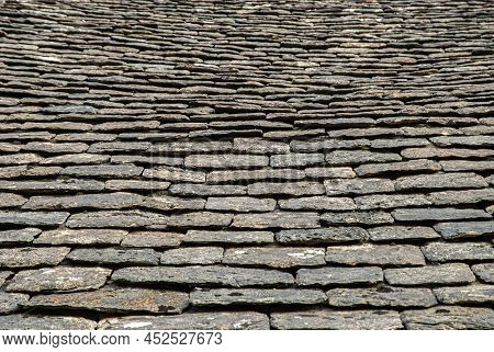 Old Stone Slade Tiles Roof Closeup As Stone Background