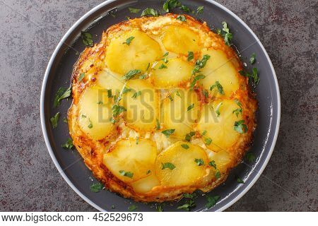English Potato Casserole Pan Haggerty Close-up In A Plate On The Table. Horizontal Top View From Abo