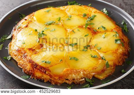 English Potato Casserole Pan Haggerty Close-up In A Plate On The Table. Horizontal