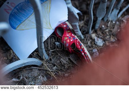 Childrens Shoes And The Flag Of Ukraine, The Warthe War In Ukraine.