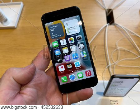 Paris, France - Ap 7, 2022: Pov At New Latest Apple Computers Iphone Se Smartphone With New Cpu, 5g 