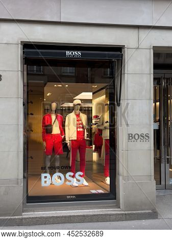 Paris, France - Ap 7, 2022: Hugo Boss Fashion Luxury Clothes Store In French City With New And Old L