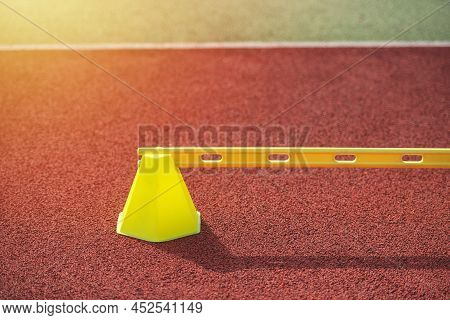 Soccer Training Equipment On Green Artificial Turf. Material For Trainning Class Of Football Academy
