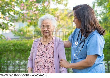 Doctor Help And Care Asian Senior Or Elderly Old Lady Woman Use Walker With Strong Health While Walk