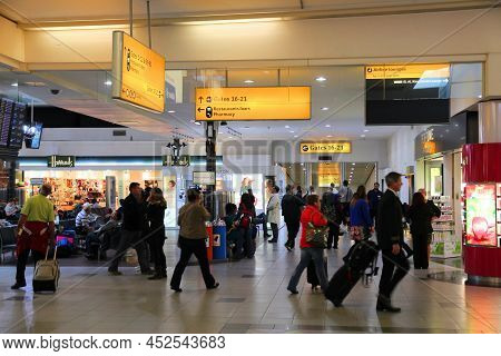 London, Uk - April 16, 2014: People Shop At Duty Free Zone Of London Heathrow Airport, Uk. Heathrow 