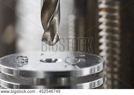 Metal Drill Bit Make Holes In Aluminium Radiator On Industrial Drilling Machine. Metal Work Industry