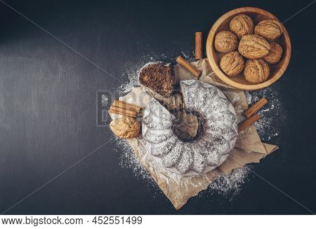 Delicious Chocolate Cake. Cupcake On A Dark Table. Chocolate Biscuit. 
Traditional Christmas Cake Pu