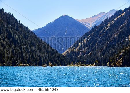 View Of A Mountain Lake Surrounded By Forest. Kolsay Lakes National Park, Kazakhstan