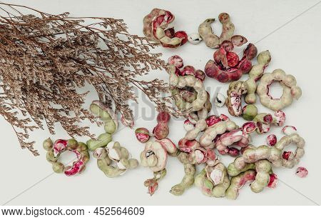 Group Of Manila Tamarind Fruit Or Pithecellobium Dulce Is Another Type Of Thai Herb With Dried Flowe