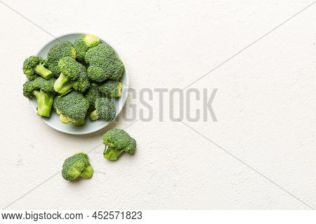 Broccoli Of Fresh Green Broccoli In Bowl Over Coloredbackground. , Close Up. Fresh Vegetable.