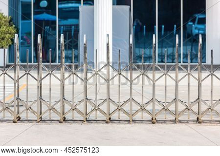 Folding Retractable Fence On Casters. Barrier On Casters. Sliding Gates On Rollers. Pedestrian Barri