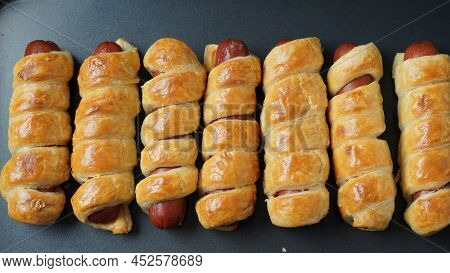 Sausage Buns. Soft Baked Bun (dough )stuffed With Sausage For Fast Food Breakfast Or Coffee Break. S