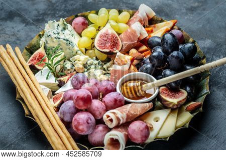 Blue Cheese And Sweet Fruit Figs. Blue Cheese Gorgonzola Picante With Blue Mold From North Of Italy.