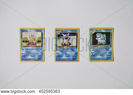Prague, Czech Republic - April 3 2022: Squirtle, Wartortle And Blastoise Evolutions Pokemon Cards Fr
