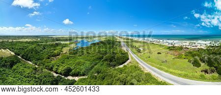 Panoramic View Of Carretera Del Caribe With Palm Trees Along The Coast Of Venezuela, Aerial View.
