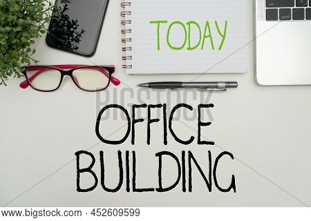 Handwriting Text Office Building. Word Written On Commercial Buildings Are Used For Commercial Purpo