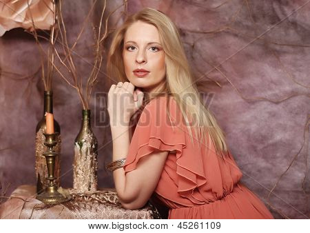 elegant sensual young woman in red dress