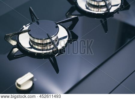 Closeup Perspective View Of Modern Expensive Black Gas Stove For Camper Rv With Glass And Metal Fini
