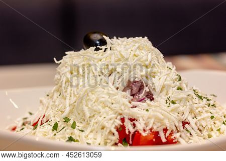 Traditional Bulgarian Shopsky Salad Is On A Plate