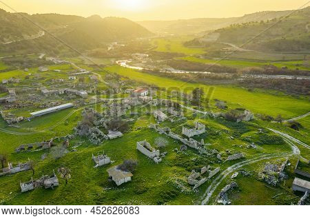 Abandoned Village Souskiou In Paphos District, Cyprus. Aerial Panorama At Sunset