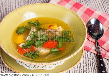 Khashlama With Lamb And Vegetables On Old Wooden Table Macro Close Up