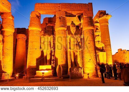 Luxor, Egypt - January 2, 2012 : Unknown Visitors Visit At The Statues Of The Great Pharaoh In Luxor
