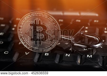 Cryptocurrency Bitcoin With Lock On Keyboard. Bitcoin Security.