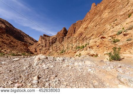 Rocky Red Slopes Of Todra Gorge In The High Atlas Near The Tinghir   ( Tinerhir ) Town. Morocco, Afr