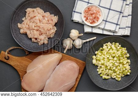 Chopped Minced Chicken Breast Fillet Of Poultry On A Cutting Board And In A Bowl, Chopped Zucchini I